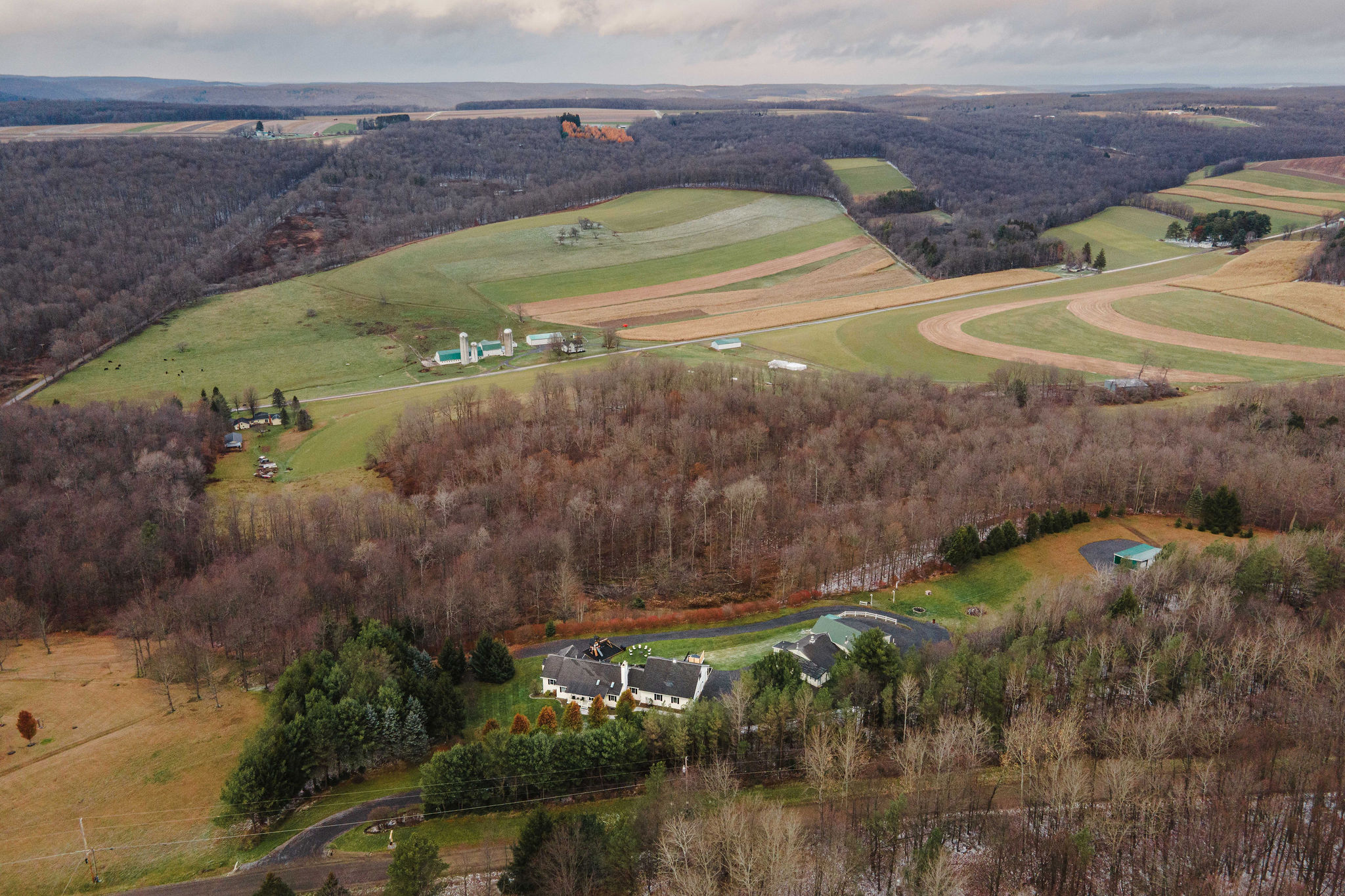 Sweeping valley and farm-country views from Windswept Pines’ hilltop perch.