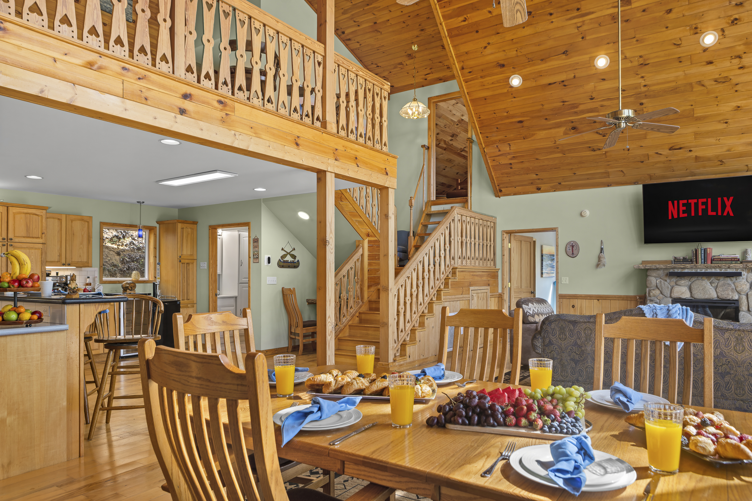 Dining Area: Delight in meals with friends against the backdrop of soaring wooden ceilings!