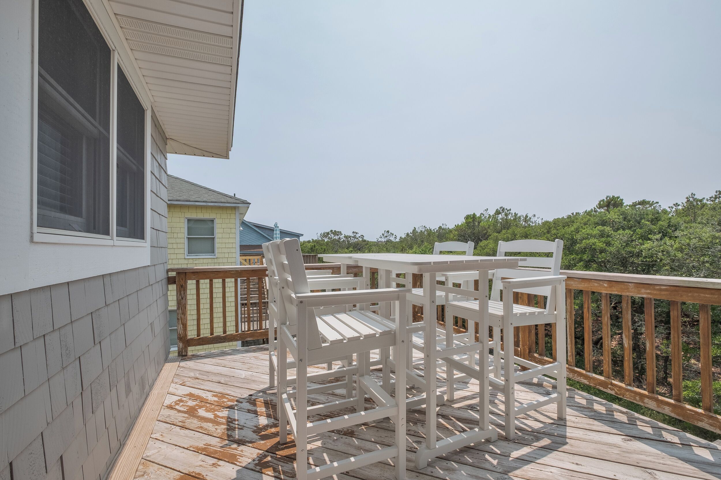 Savor your breakfast or sunset drinks on this elevated dining deck