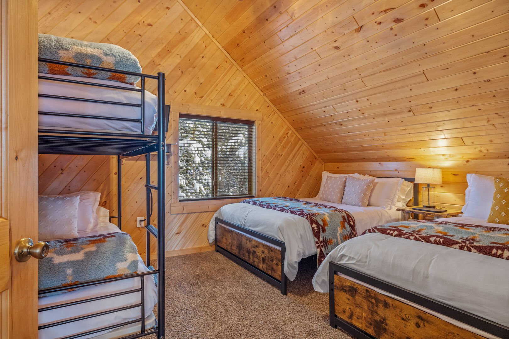 Bedroom #3 w/ 2 queen sized beds and 1 twin over twin bunk bed