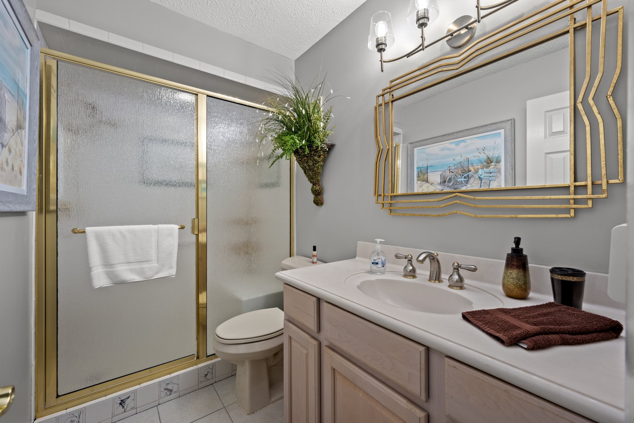 master bath with walk in shower and bench