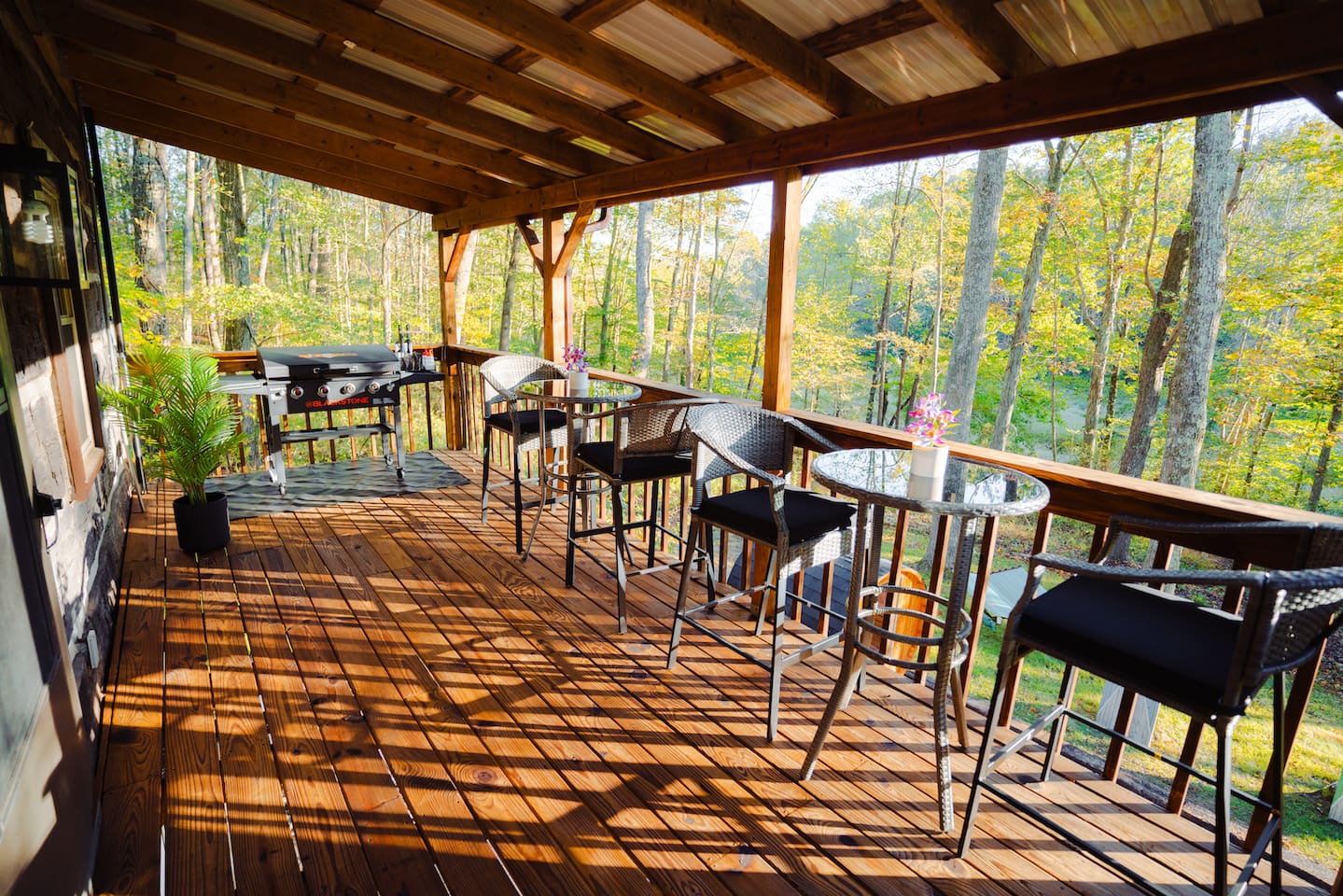Enjoy the views from the covered, the perfect spot to sip your morning coffee.