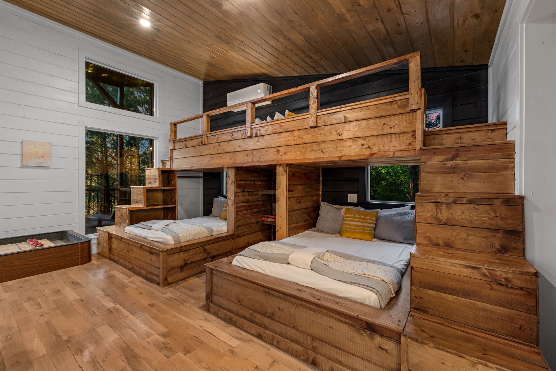 A fun, thoughtfully designed space with multiple sleeping areas, perfect for groups or kids to rest comfortably together. ✨