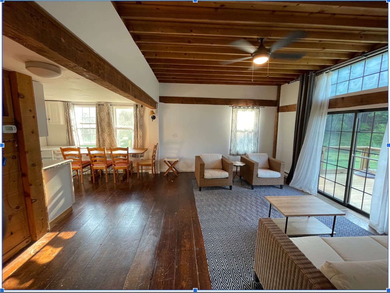 Living room of 2 bedroom barn apartment seen from 2nd bedroom