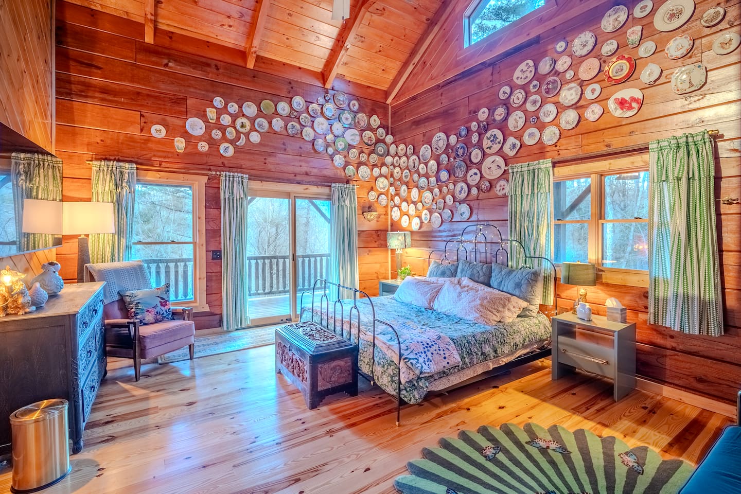 The Porcelain Room's quirky bold design and spacious interior make for a comfortable stay. Step onto the wrap around porch with your coffee, read in bed, or take a bath in your private en suite bath. 