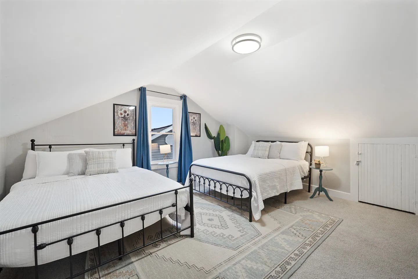 A small closet provides storage in the Double Queen Bedroom with room darkening shades.