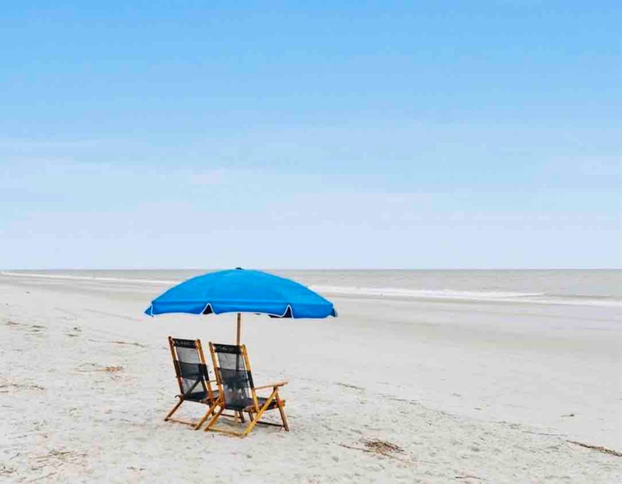 Beach chairs and umbrella