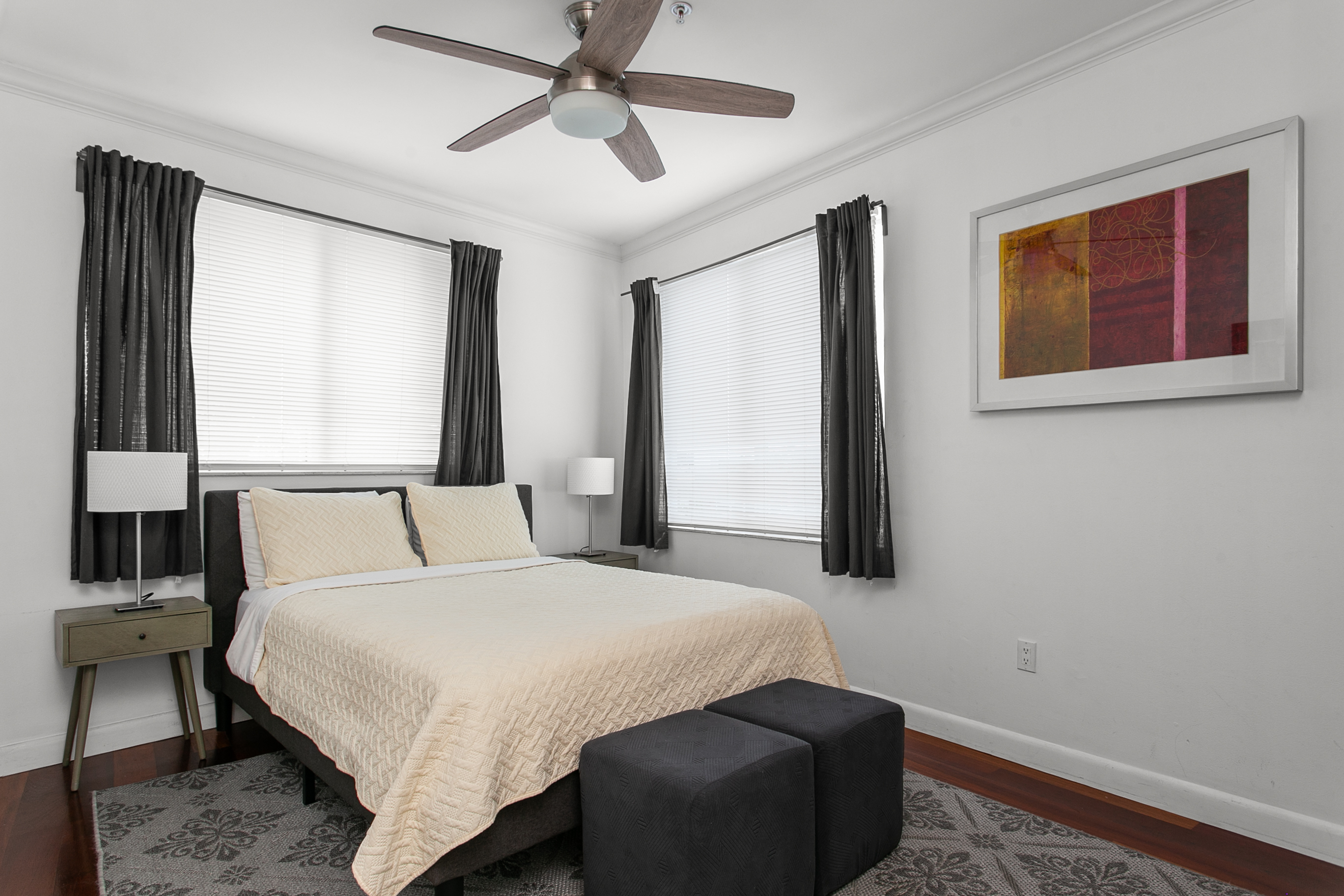 Guest Suite with en-suite bath, closet storage, and room-darkening curtains