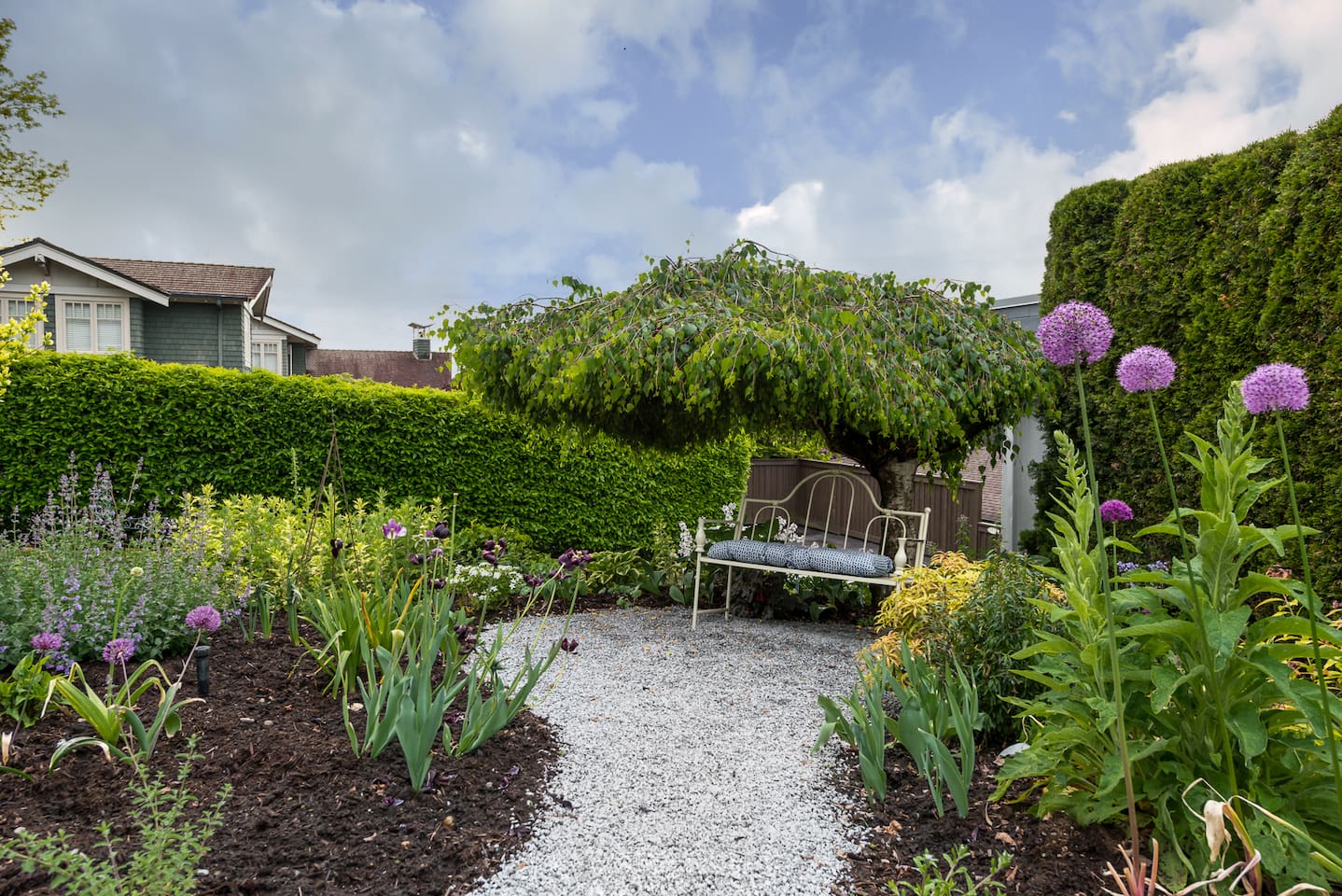 A sweet garden bench for quiet moments.