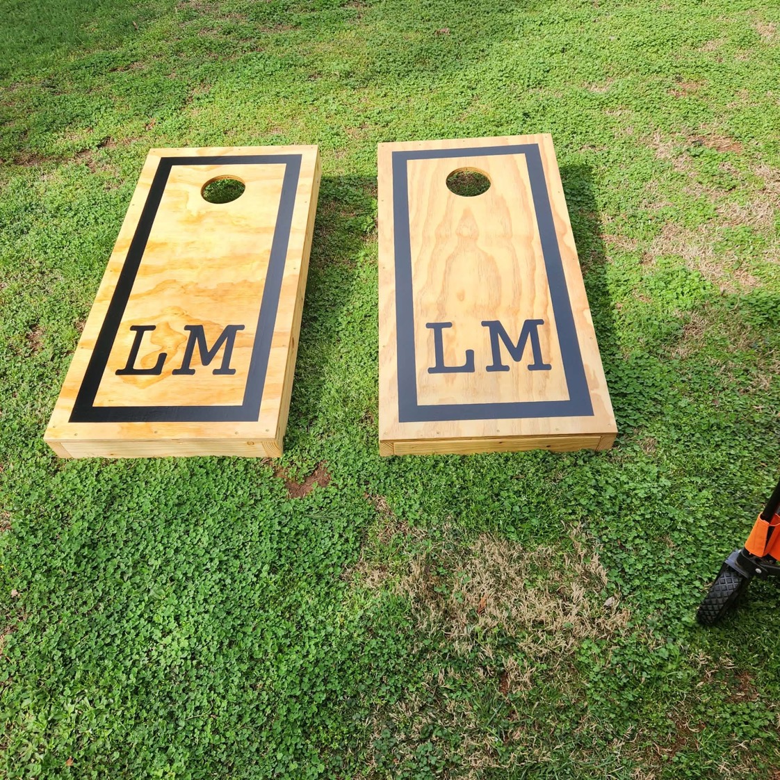 Relax, unwind, and challenge your friends & family to a game of cornhole in the back yard.