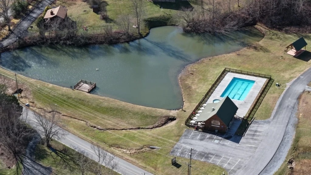 Outdoor swimming pool and fishing pond
