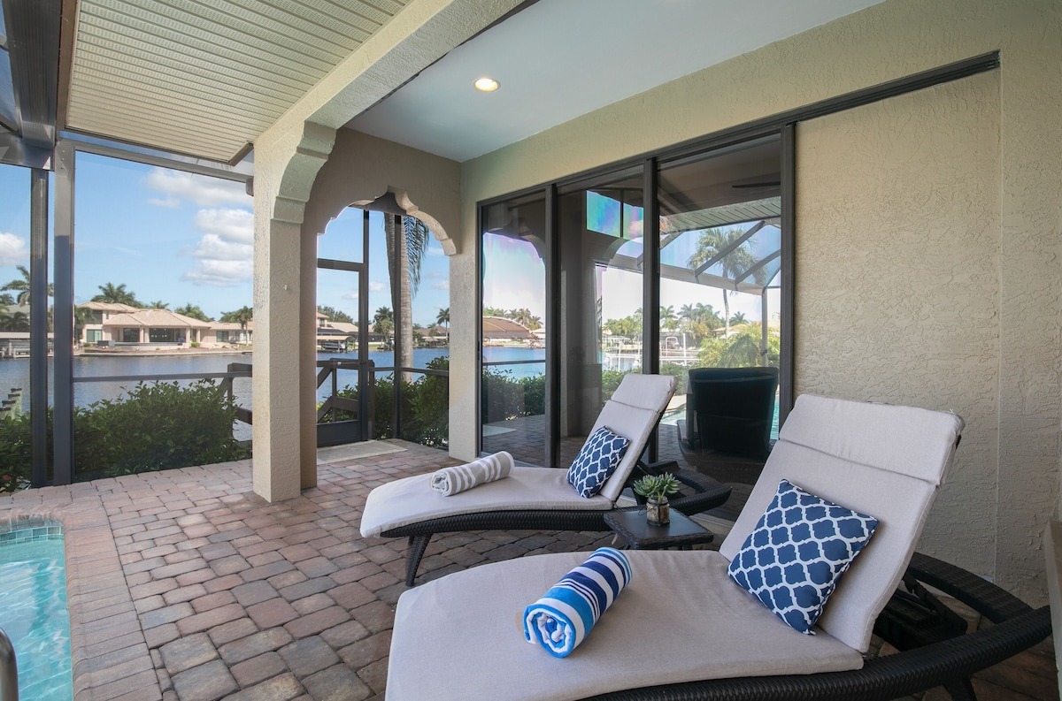 Relax and soak up the sun on comfortable poolside lounging chairs.