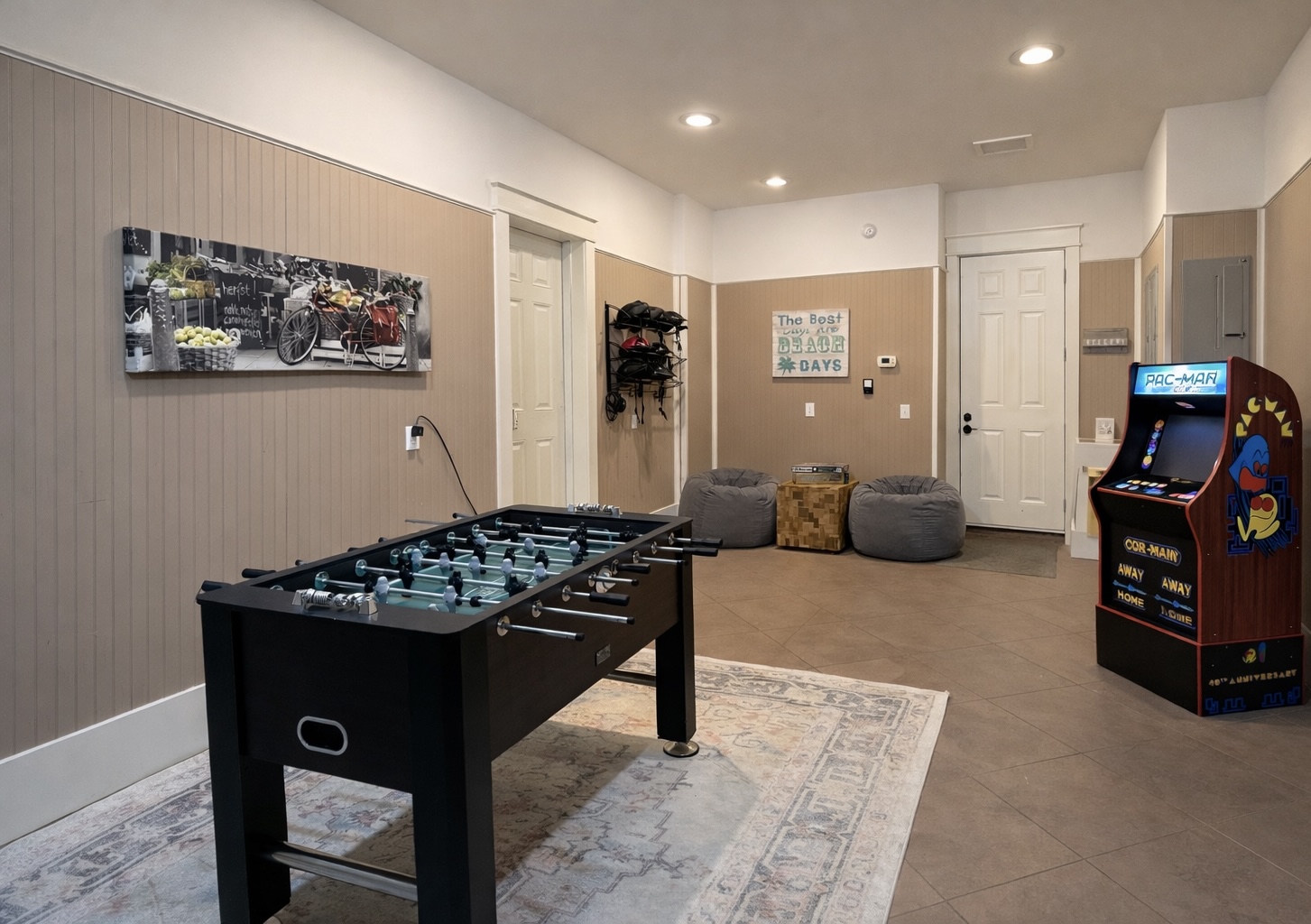 Garage Game Room, Pac man arcade machine, foosball, and boardgames!