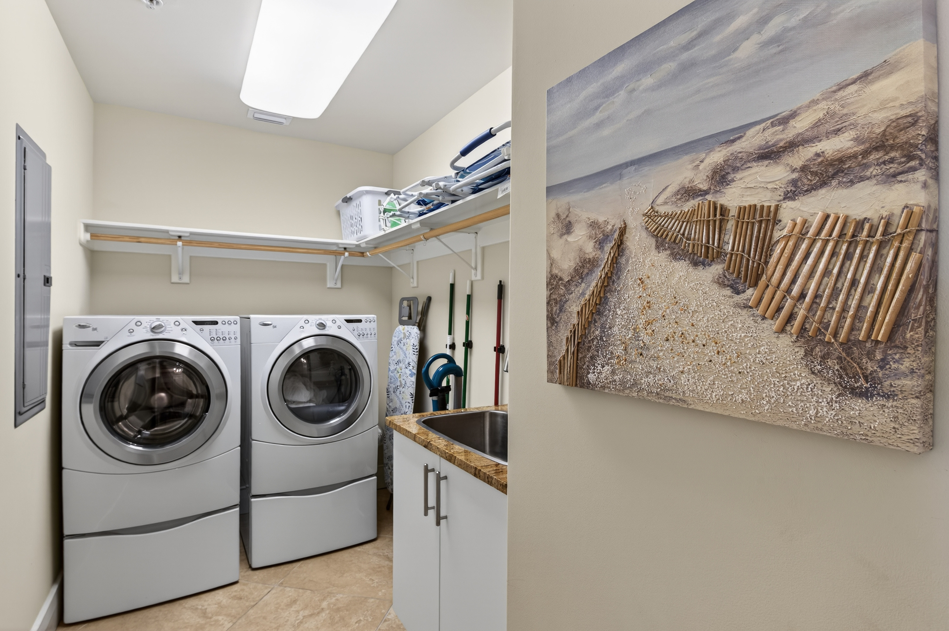 Laundry room, full size washer / dryer, sink