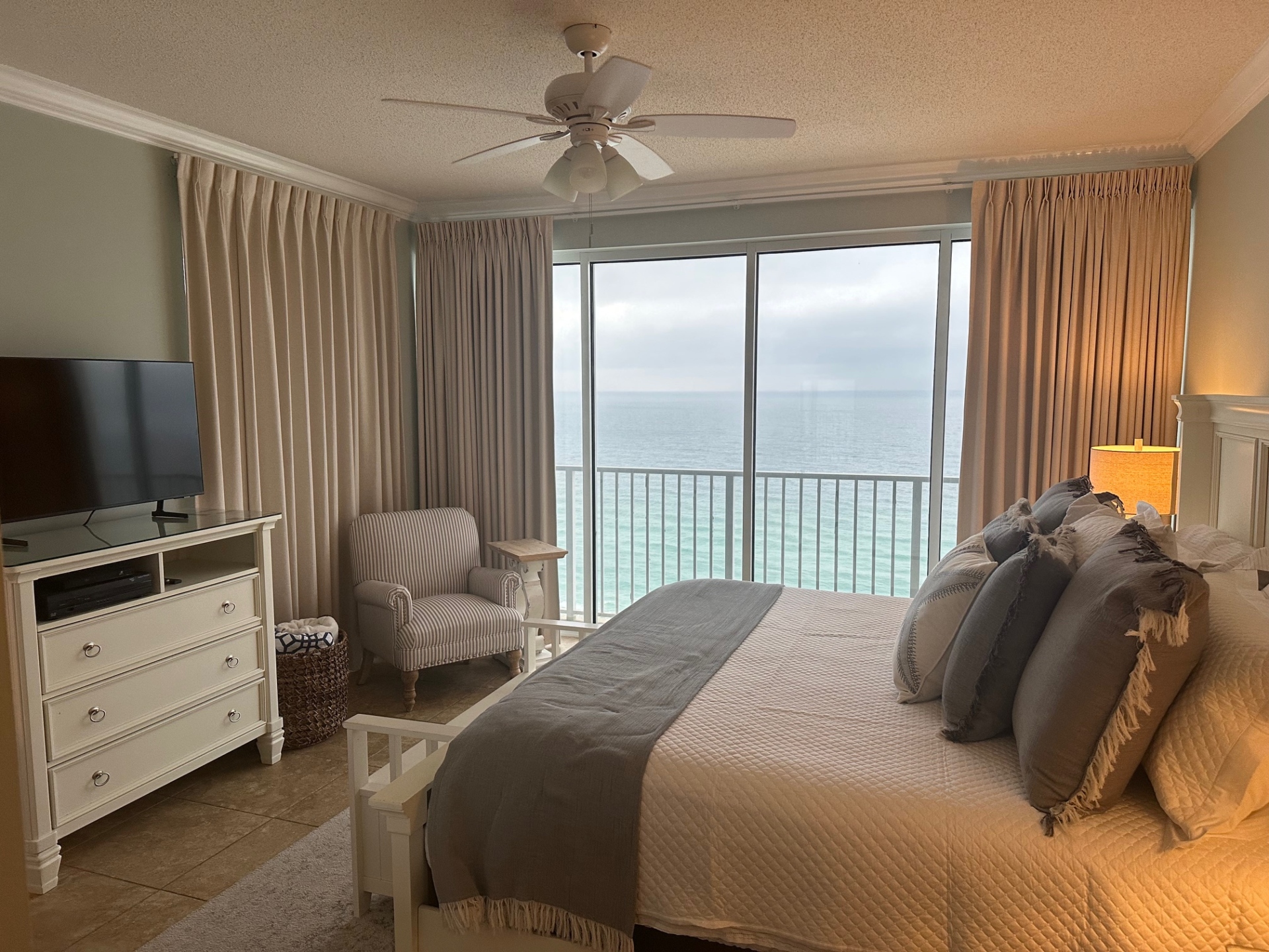 Master bedroom with king bed and beach view