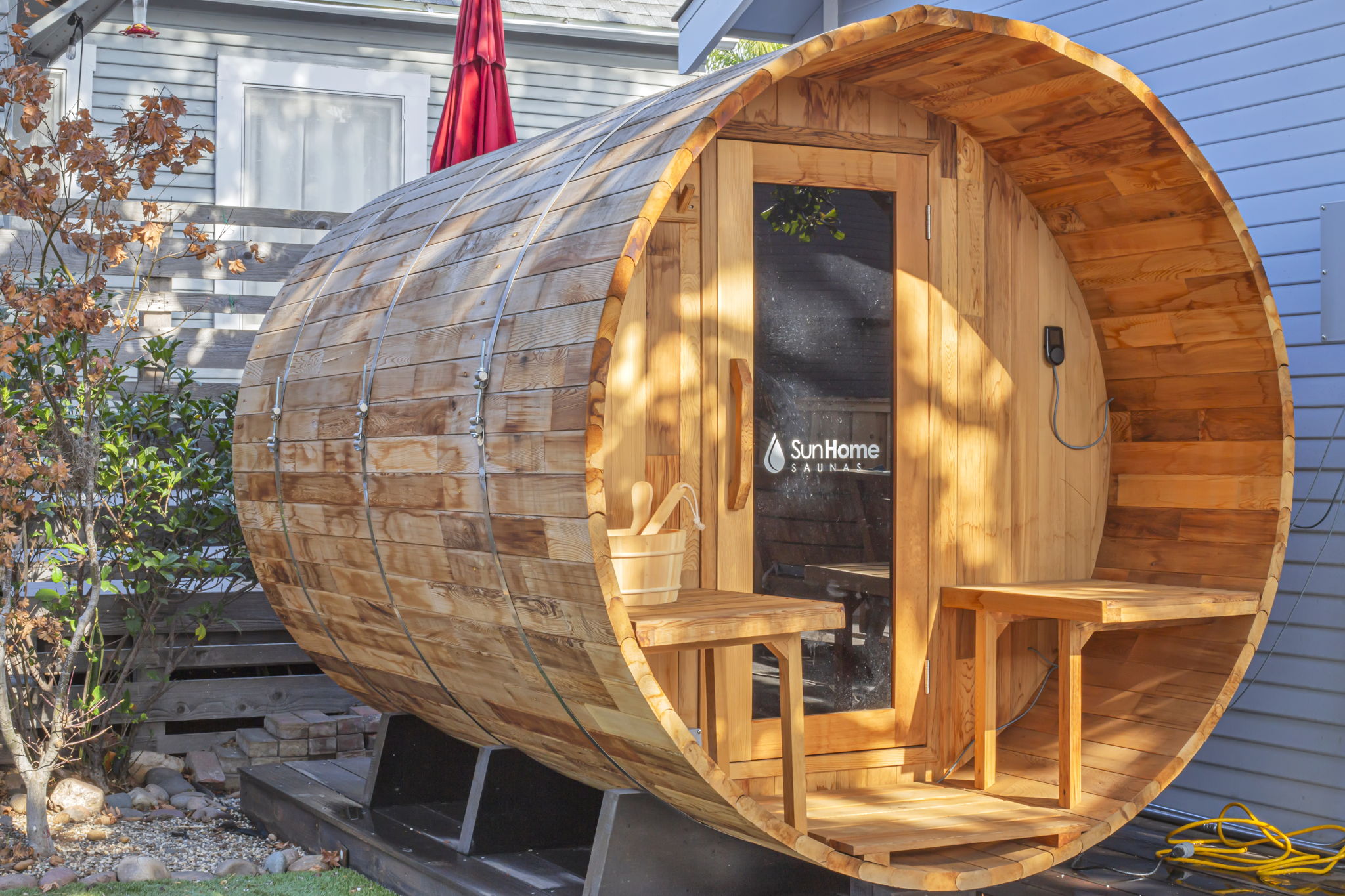 Step into our backyard barrel sauna for the ultimate relaxation experience. Whether you’re winding down after a day at the beach or starting your morning with some heat therapy, this cozy retreat is all yours.