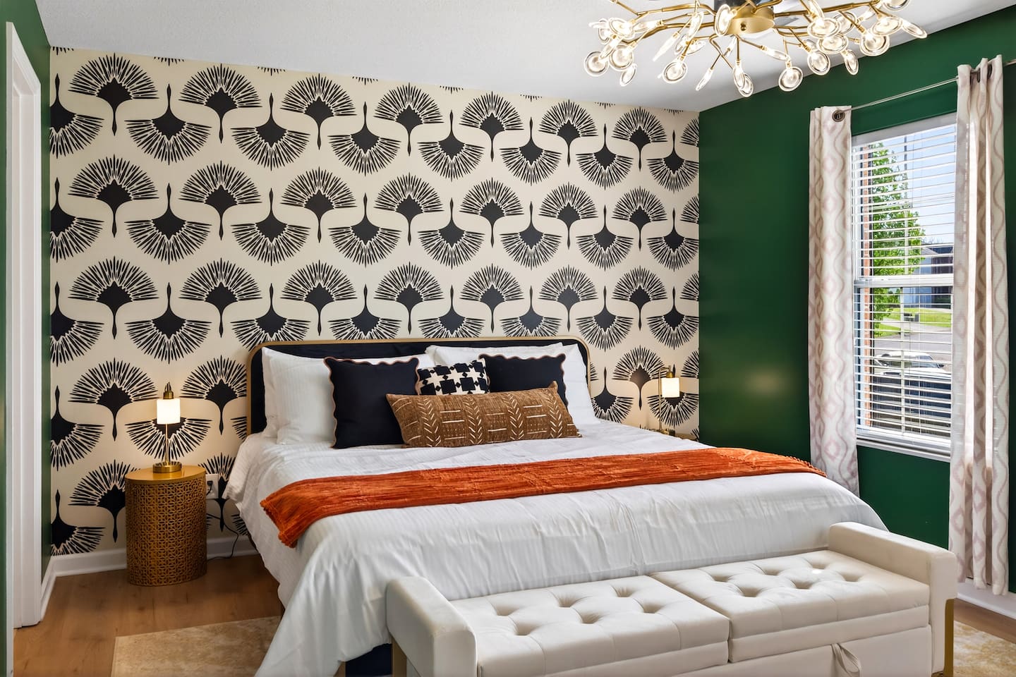 Designer Master suite with comfortable King bed and ceiling fan/light. 