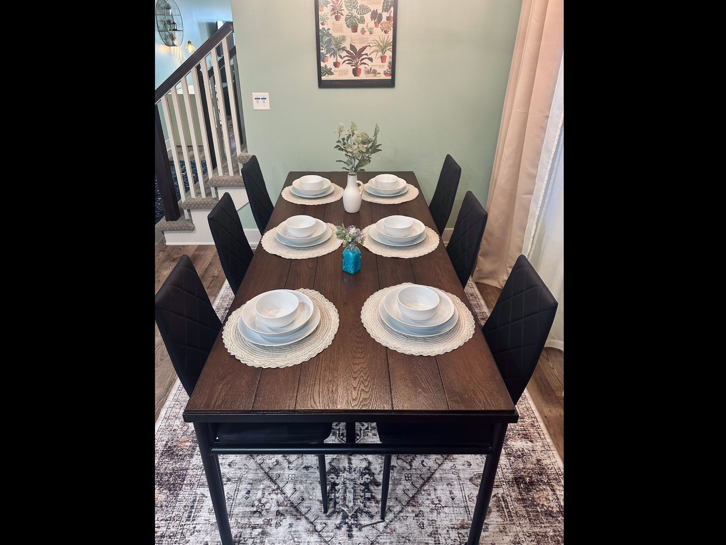 Dining area with seating for six, thoughtfully arranged for shared meals, conversation, and comfortable gatherings.