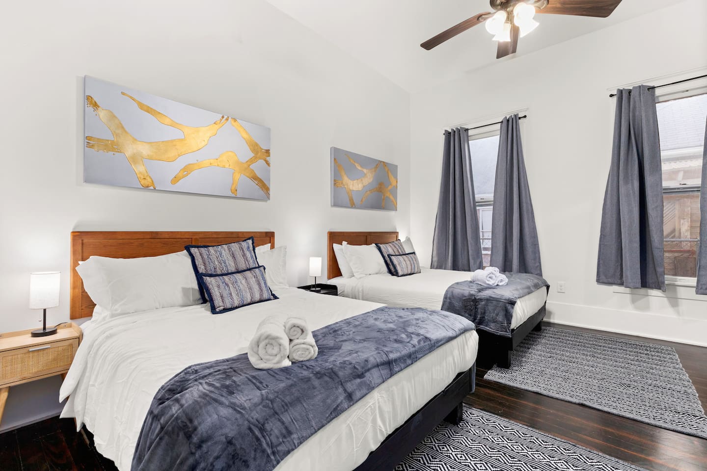 Dream sweet in our serene bedrooms featuring comfortable beds, soft linens, and tranquil wall art for a restful night's sleep.