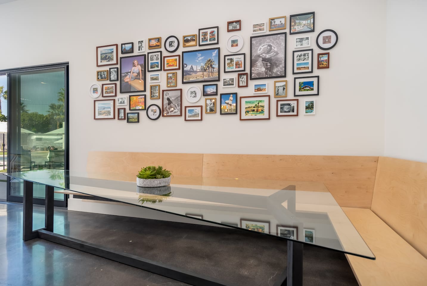 Custom Bulthaup-inspired floating breakfast booth with seating for 10