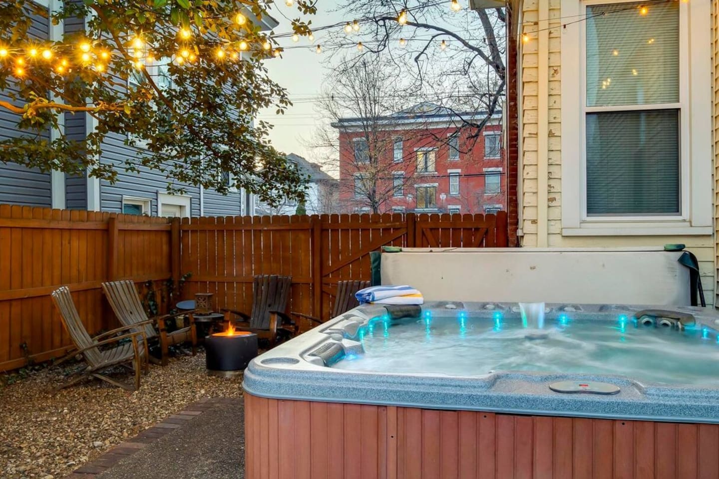 Outdoor patio and hot tub. Hot tub exclusively for the guests of this unit. 