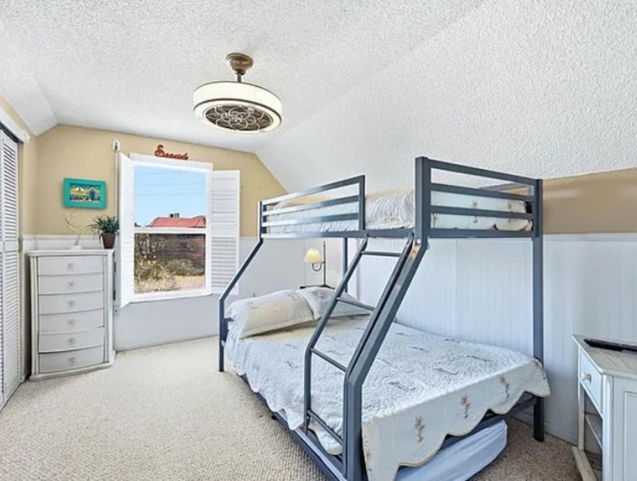 Bunkbed featuring a full and twin with an additional trundle bed underneath ensuring the kiddos have plenty of space for a restful night! 