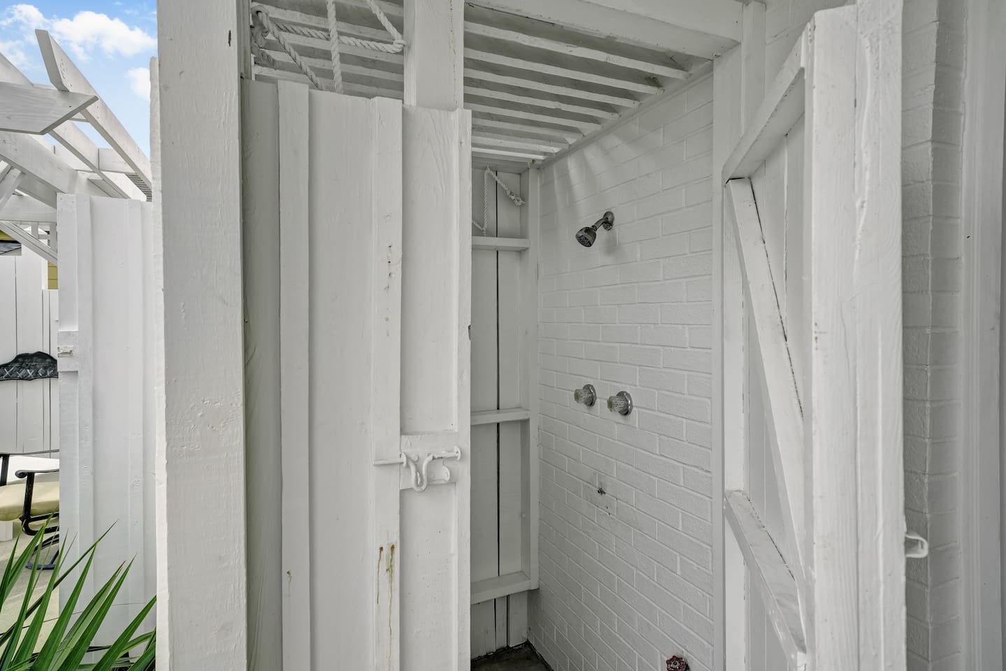 Clean, private outdoor shower with hot and cold water