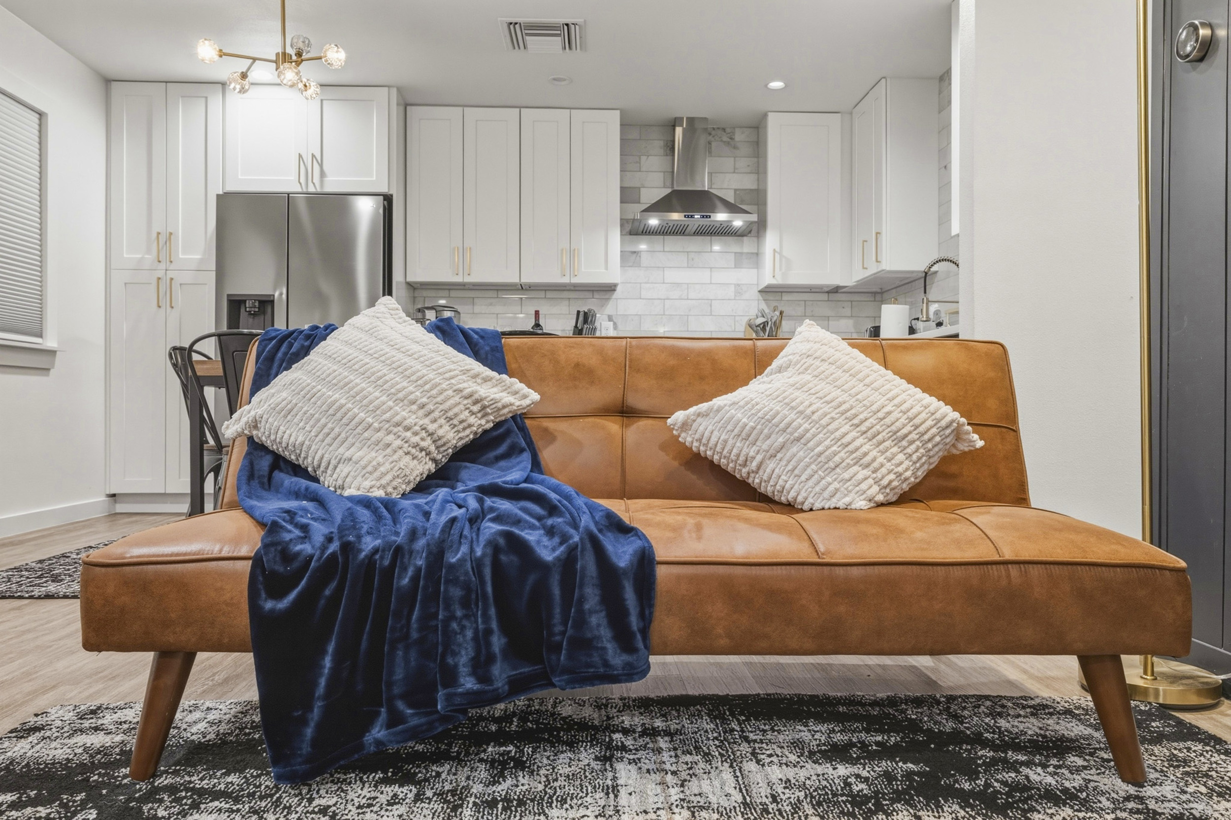 Stylish leather seating and modern decor create the perfect retreat for relaxation!
