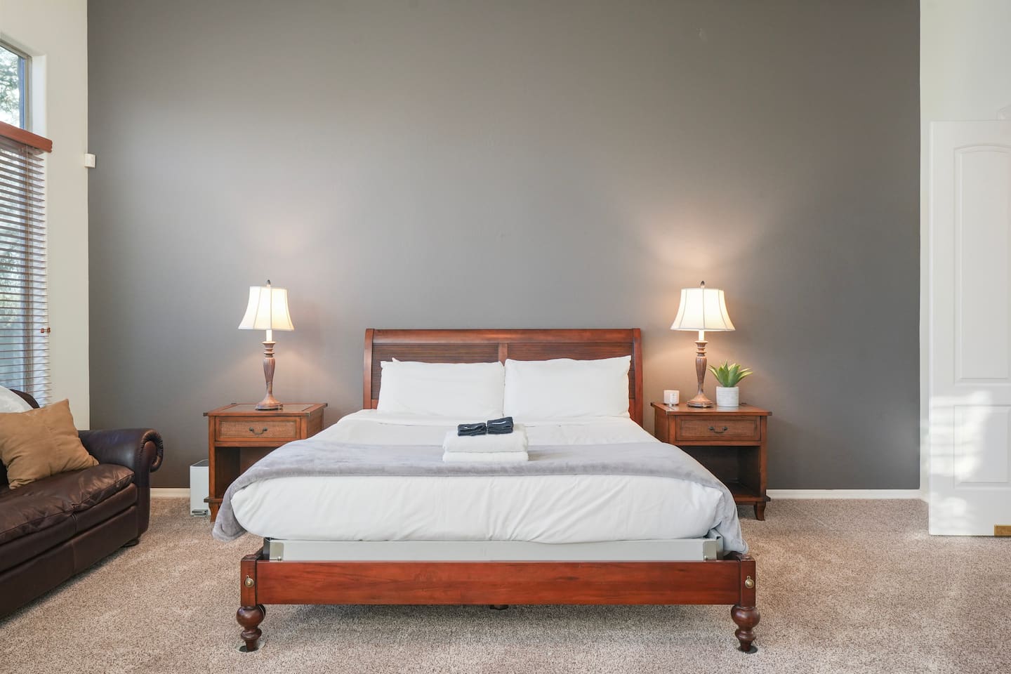 King-size bed with luxury linens and a calming, modern design