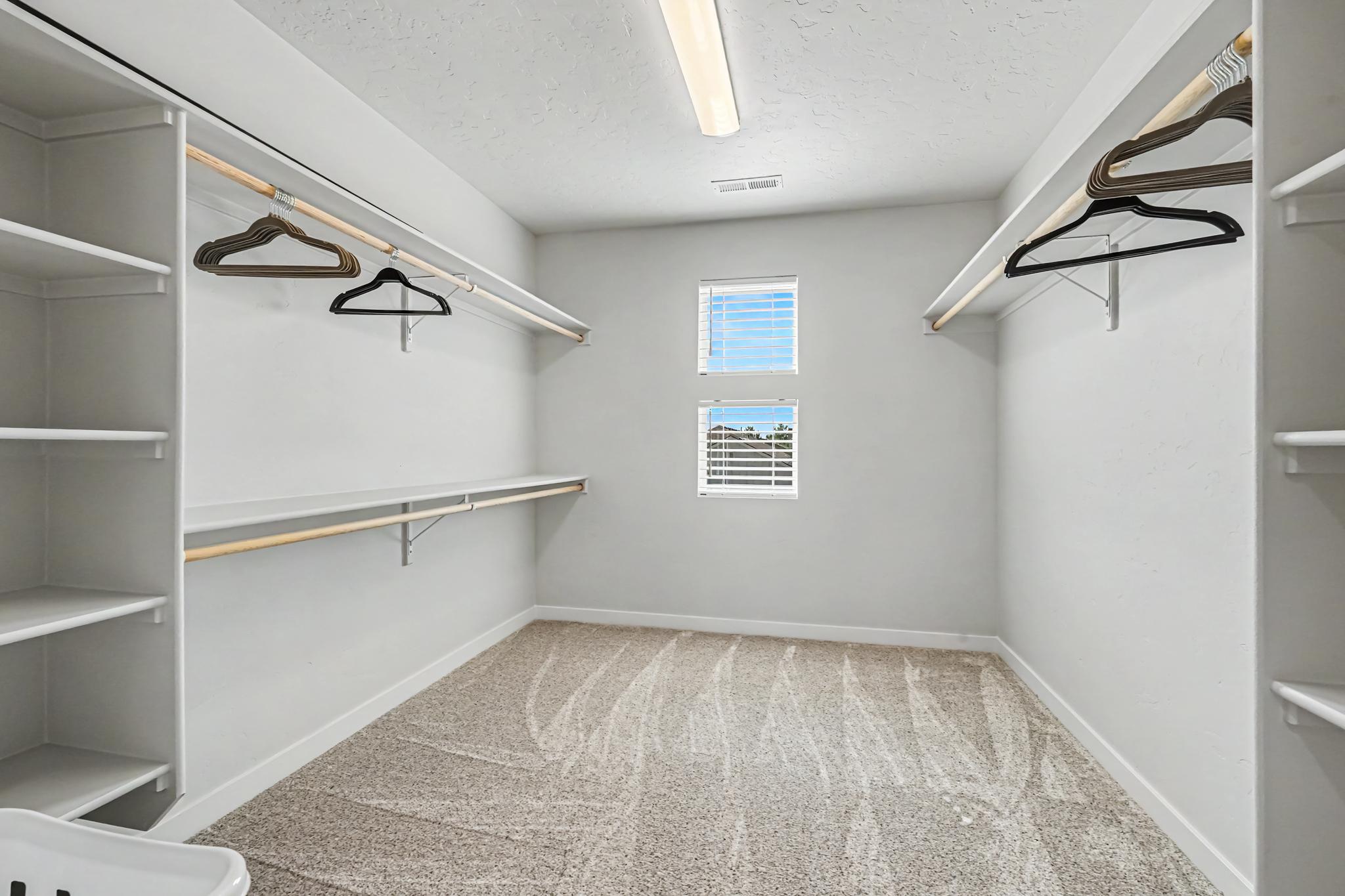 The master bedroom features an incredibly spacious walk-in closet, practically large enough to be a sixth bedroom! Enjoy plenty of room for all your clothing, luggage, and personal belongings.