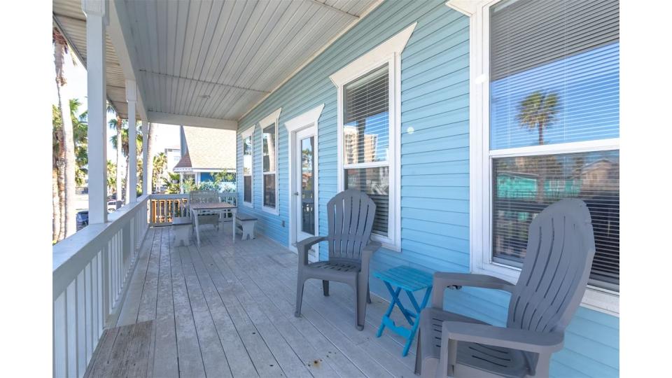 Start your mornings on the spacious front porch with island breezes and your coffee in hand. Multiple seating areas provide the perfect spot for sunset watching, reading, or simply soaking in the coastal atmosphere. 