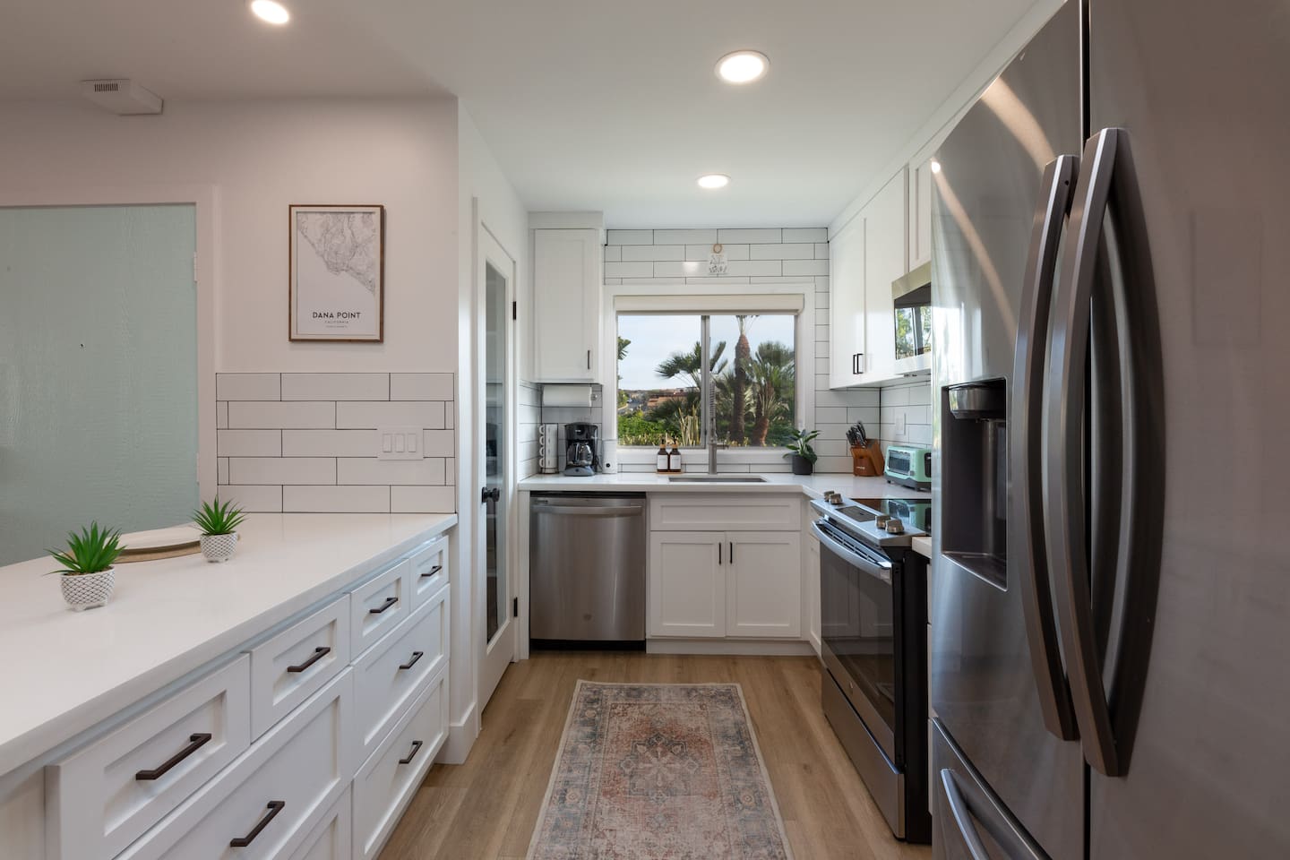 open concept kitchen with views of ocean 