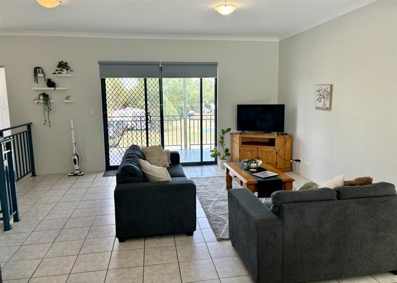 Upstairs living with front balcony