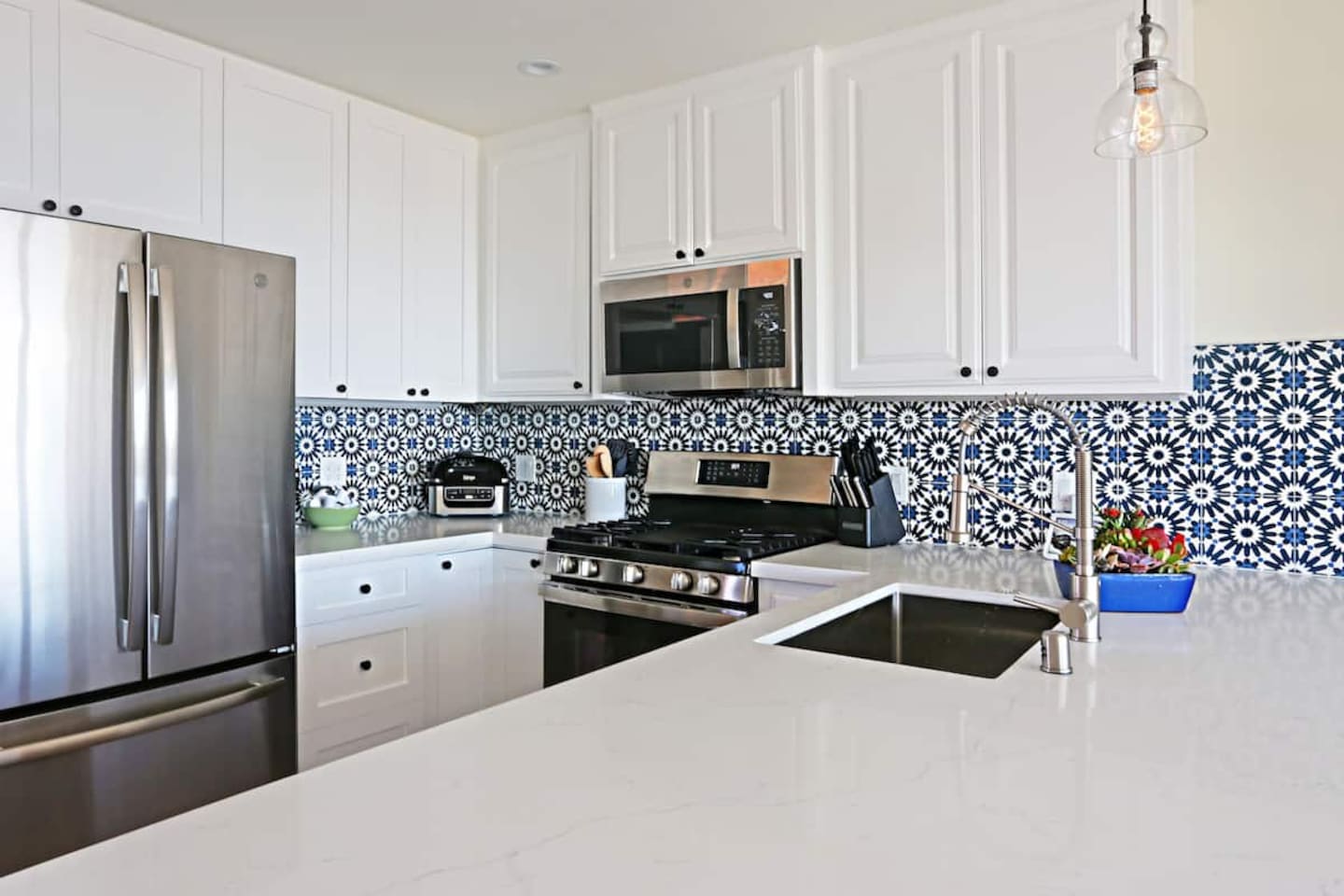Fully remodeled in Aug 2021, the kitchen is fully equipped enough to prepare almost any meal. It also has quartz countertops, new appliances, a fridge with filtered water and ice, a breakfast bar and good-sized kitchen table for meals or as a desk.