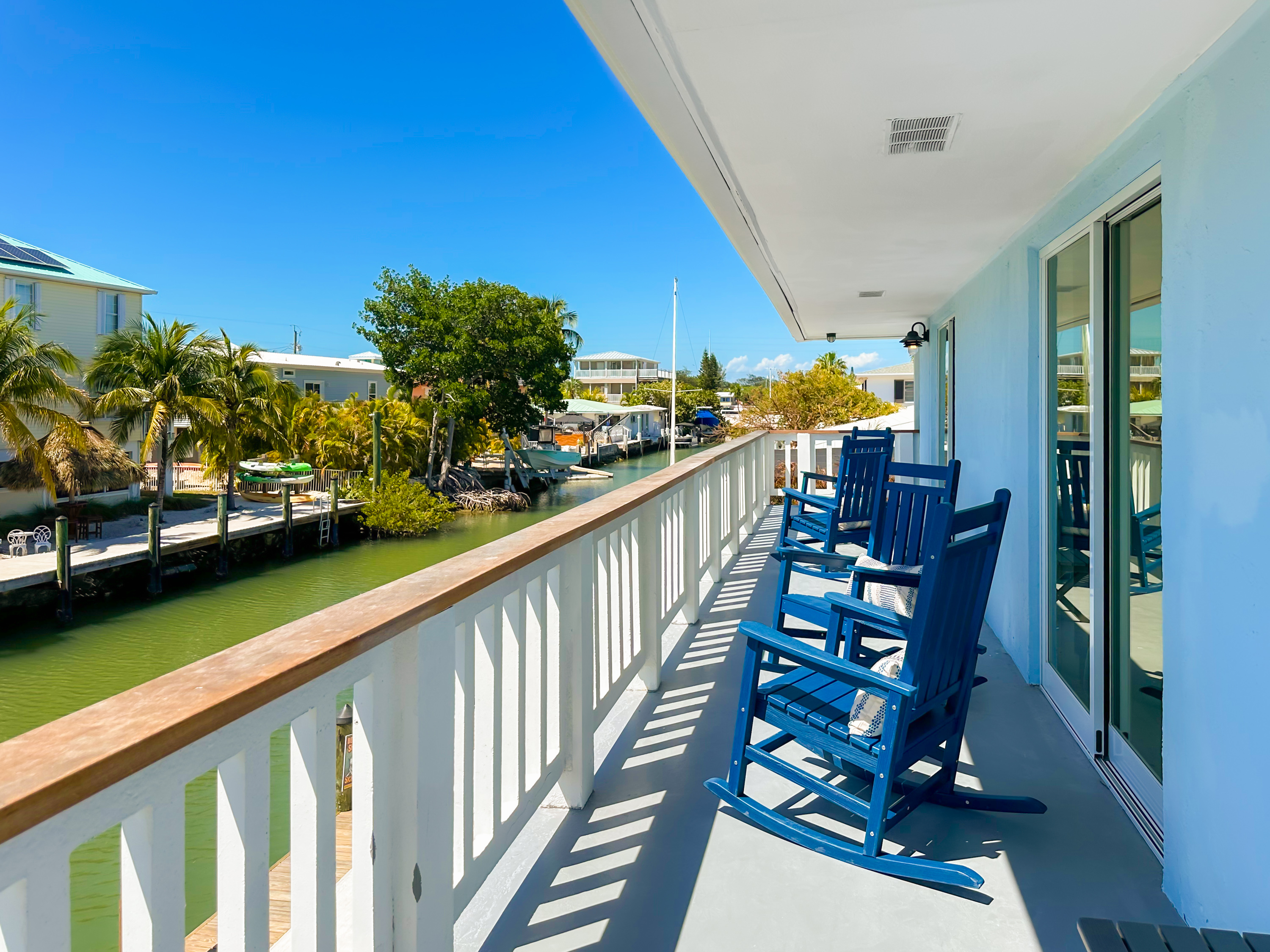 Relax while catching the breeze and watching people on the canal.