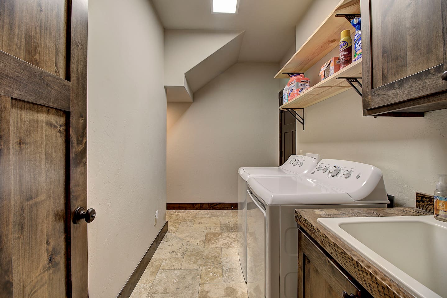 Full-size washer and dryer with everything you need on hand, this laundry space makes it easy to stay fresh for every adventure.