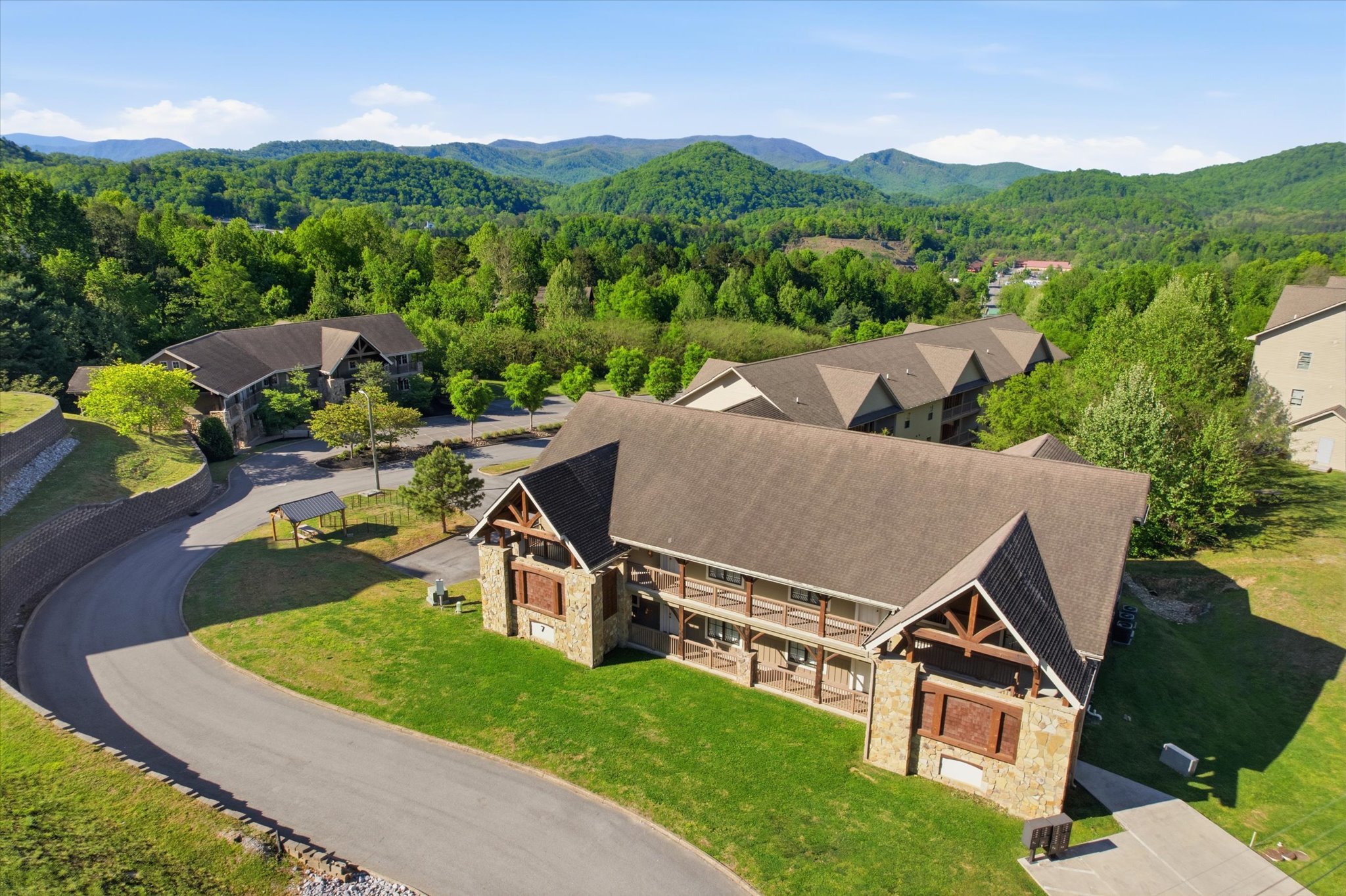 Take in the full view of Hearthstone Lodge, where the scale of the building hints at the spacious, group-friendly stays waiting inside, all set within the peaceful surroundings of Serenity Ridge Resort.