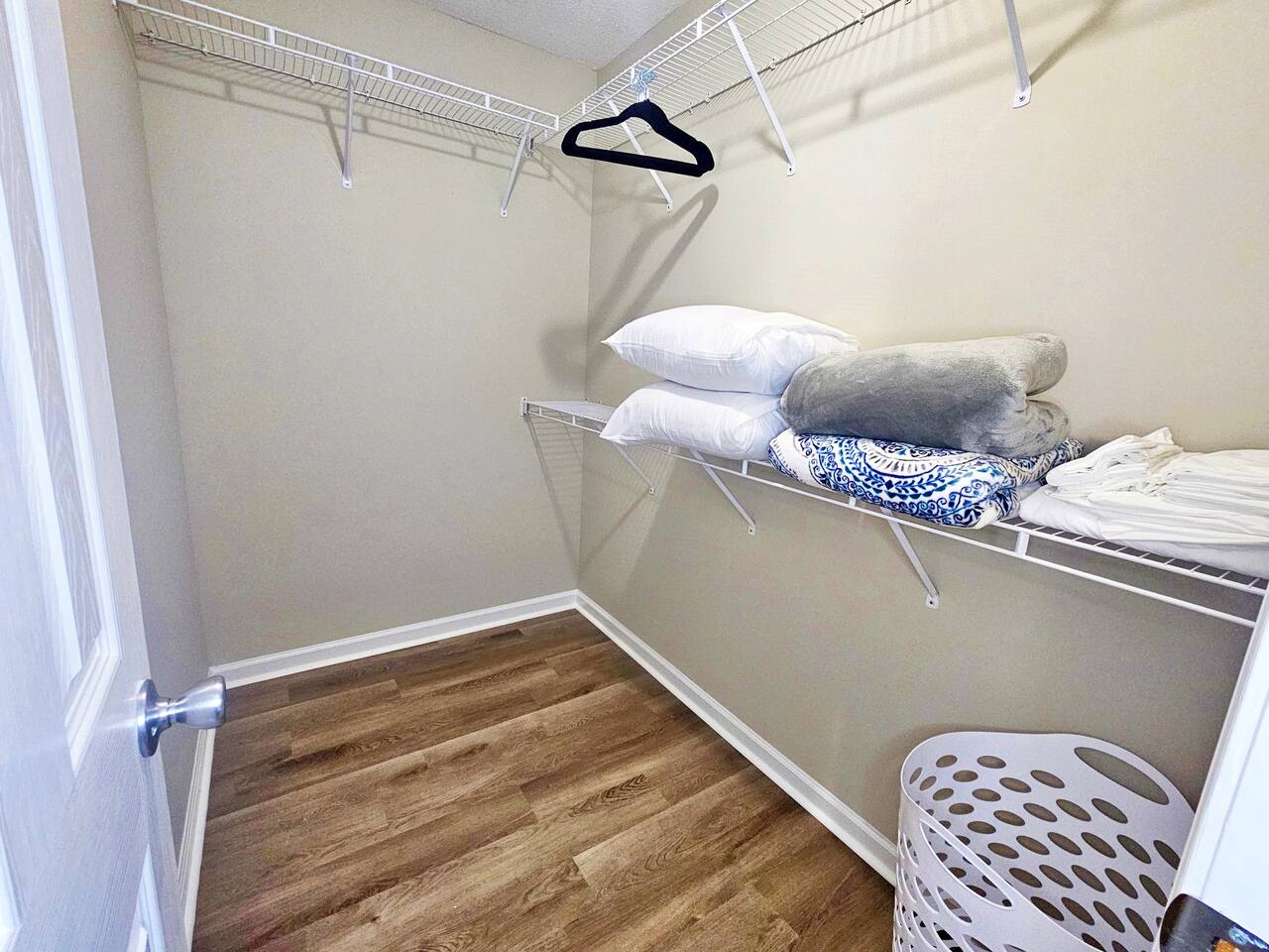 This walk-in closet is located in the main room. There is plenty of space for storage. You will find extra blankets, pillows, and linen here. Velvet hangers included. 