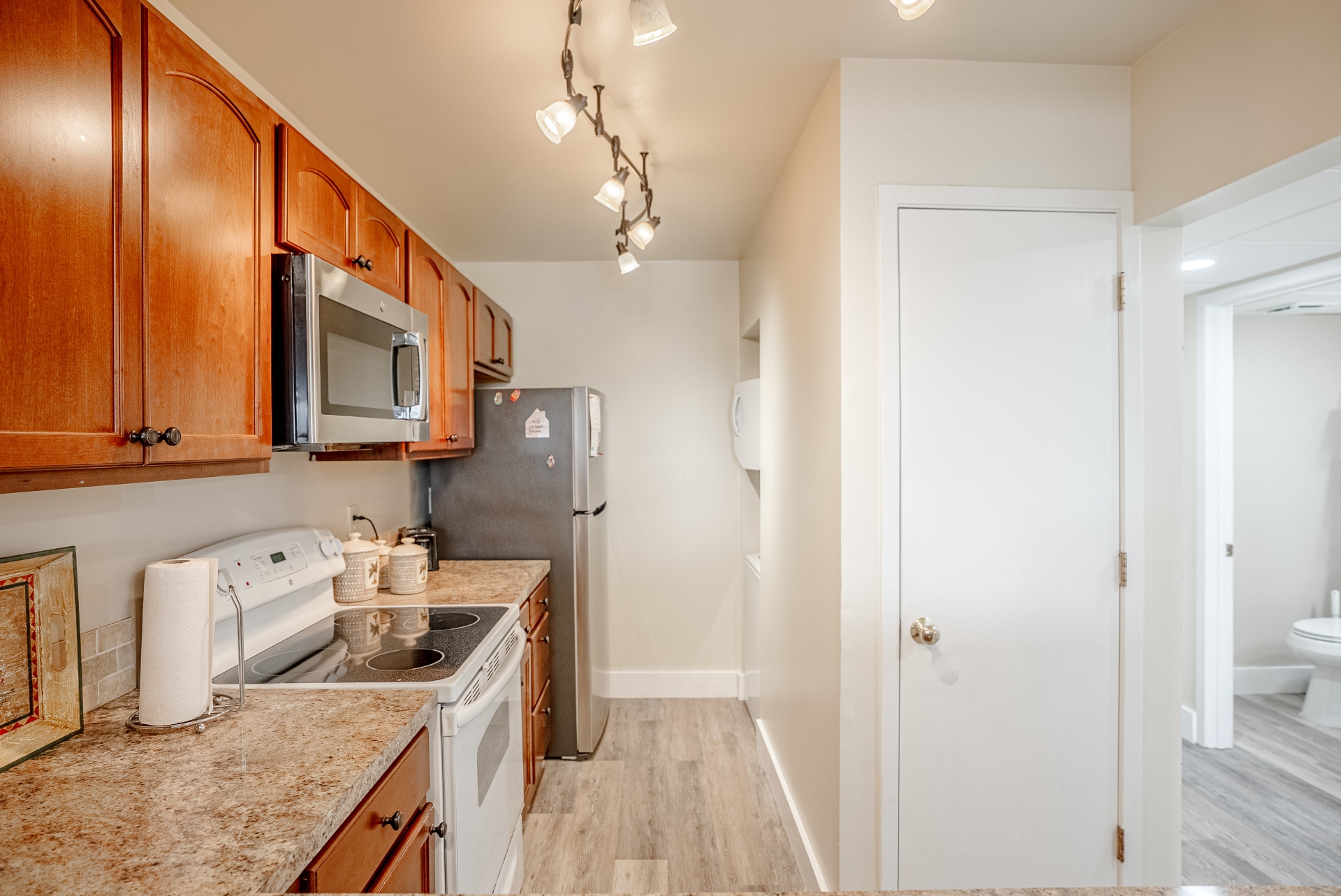 Kitchen with washer and dryer