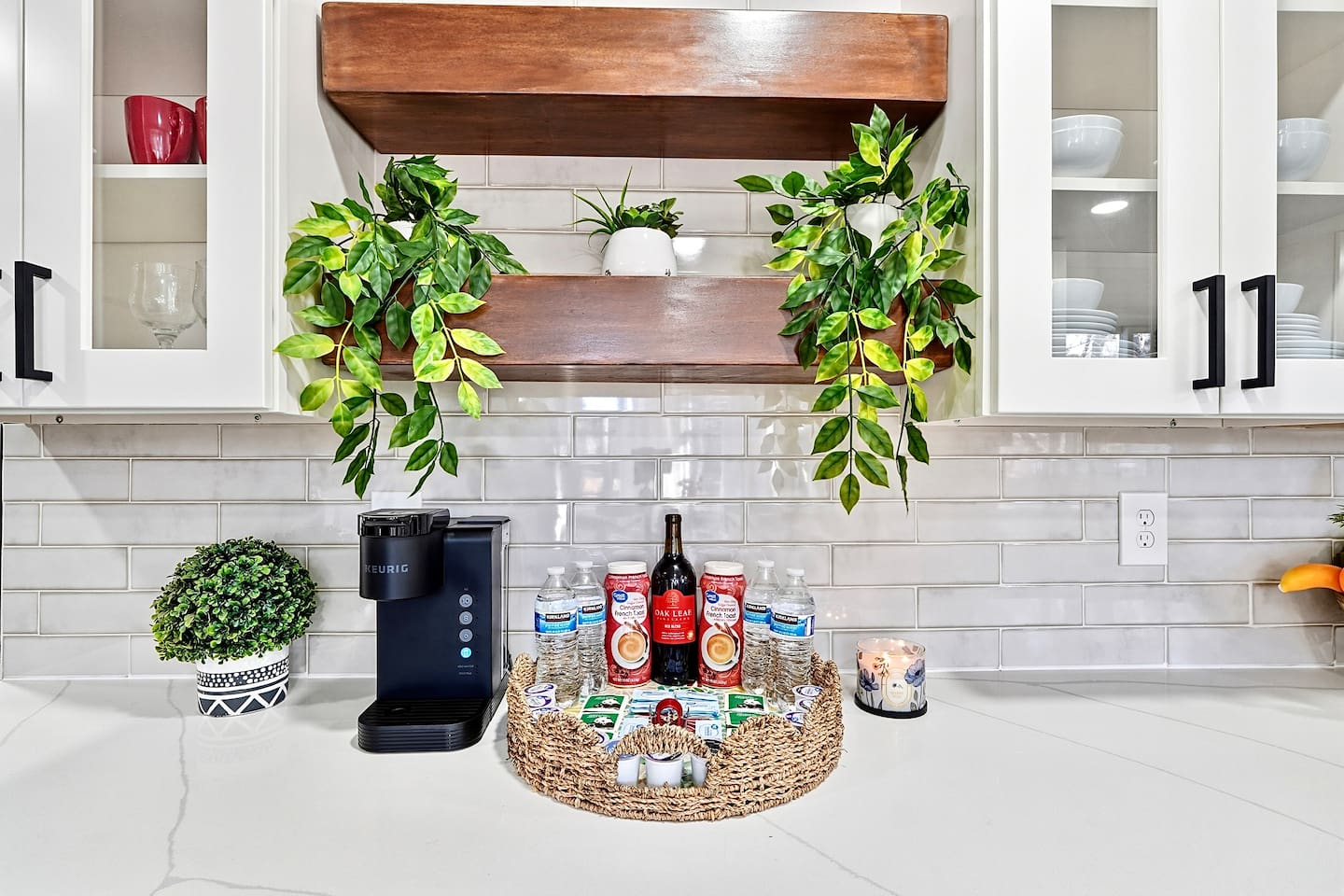 Bright white kitchen with a sleek, extended layout and ample counter space. The long layout offers plenty of countertop space, perfect for cooking, prepping, and everyday meals. Fully stocked with everything you need for a comfortable stay!
