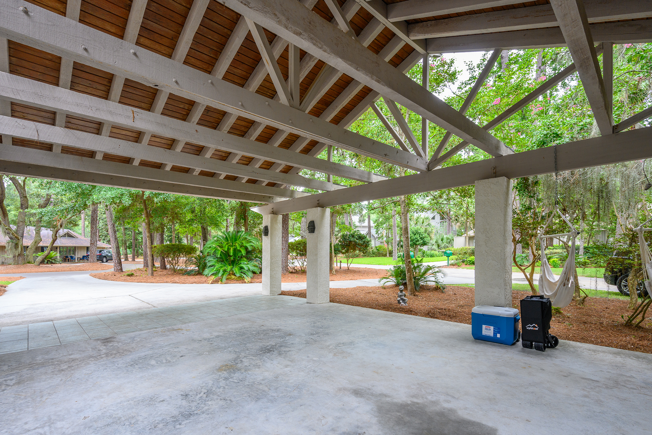 A large Coleman cooler on wheels, along with a heavy duty beach cart that can cary the 4 beach chairs and beach towels provided for your convenience.  Everthing you need to head straight to the beach!   !