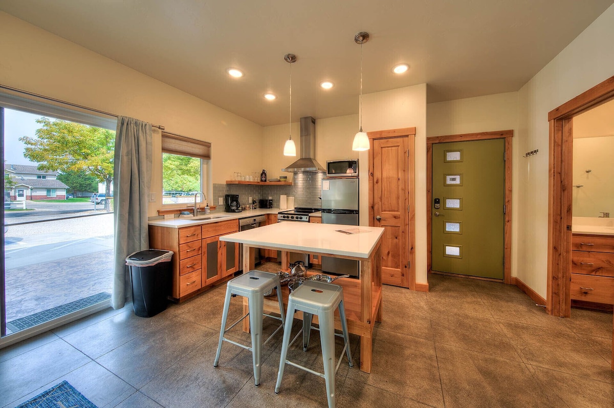 Stylish custom kitchen with island and patio access