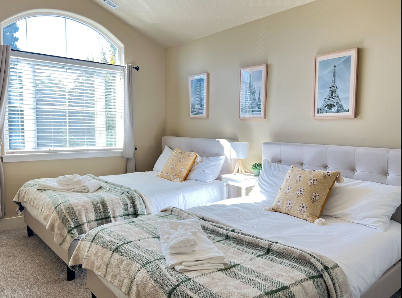 This bedroom has 2 full-sized beds.