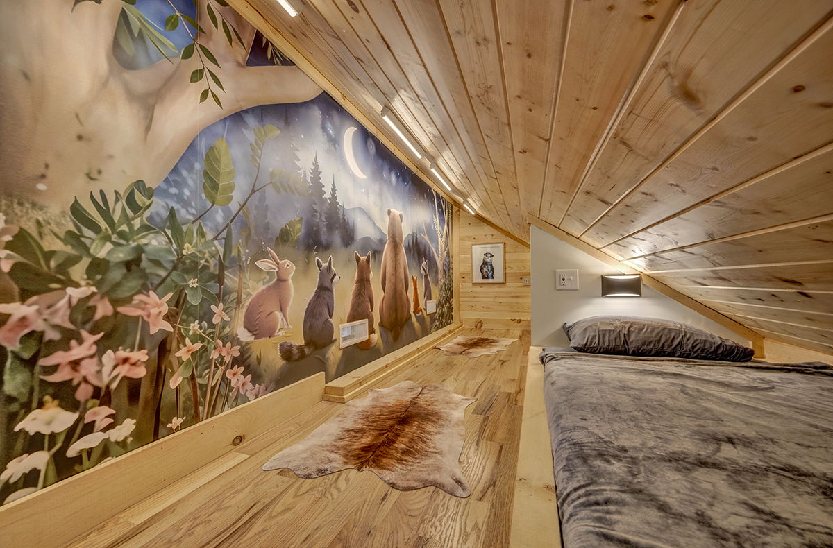 Two Custom built-in twin beds with individual reading lights, white noise machine and cozy bedding.