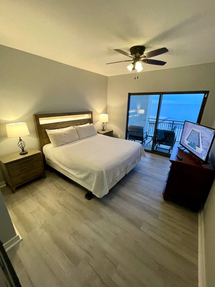 East Master bedroom king bed, balcony. built in USB in night stands