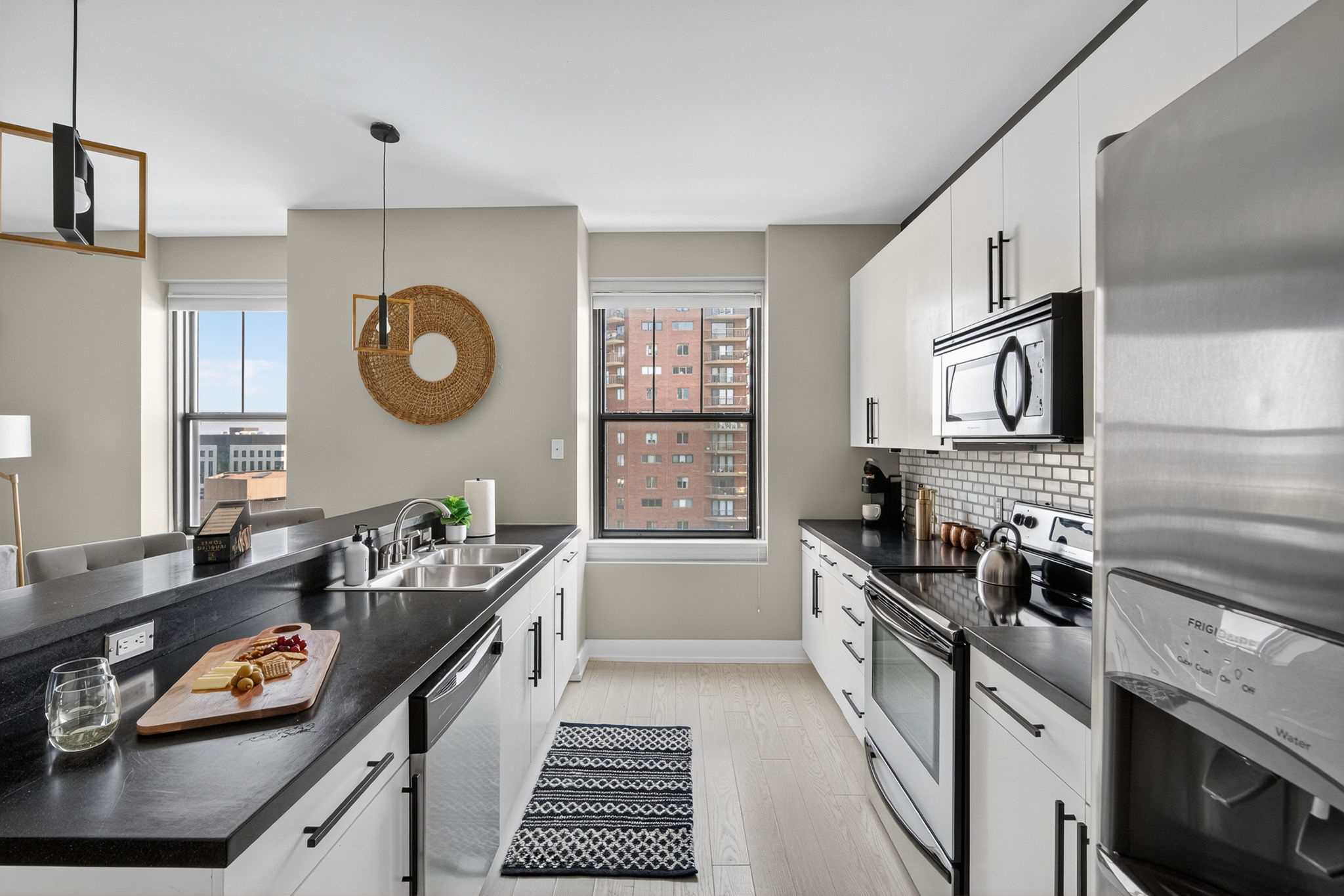 A functional and beautifully designed kitchen with bar seating, full-size appliances, and all the essentials for your stay.