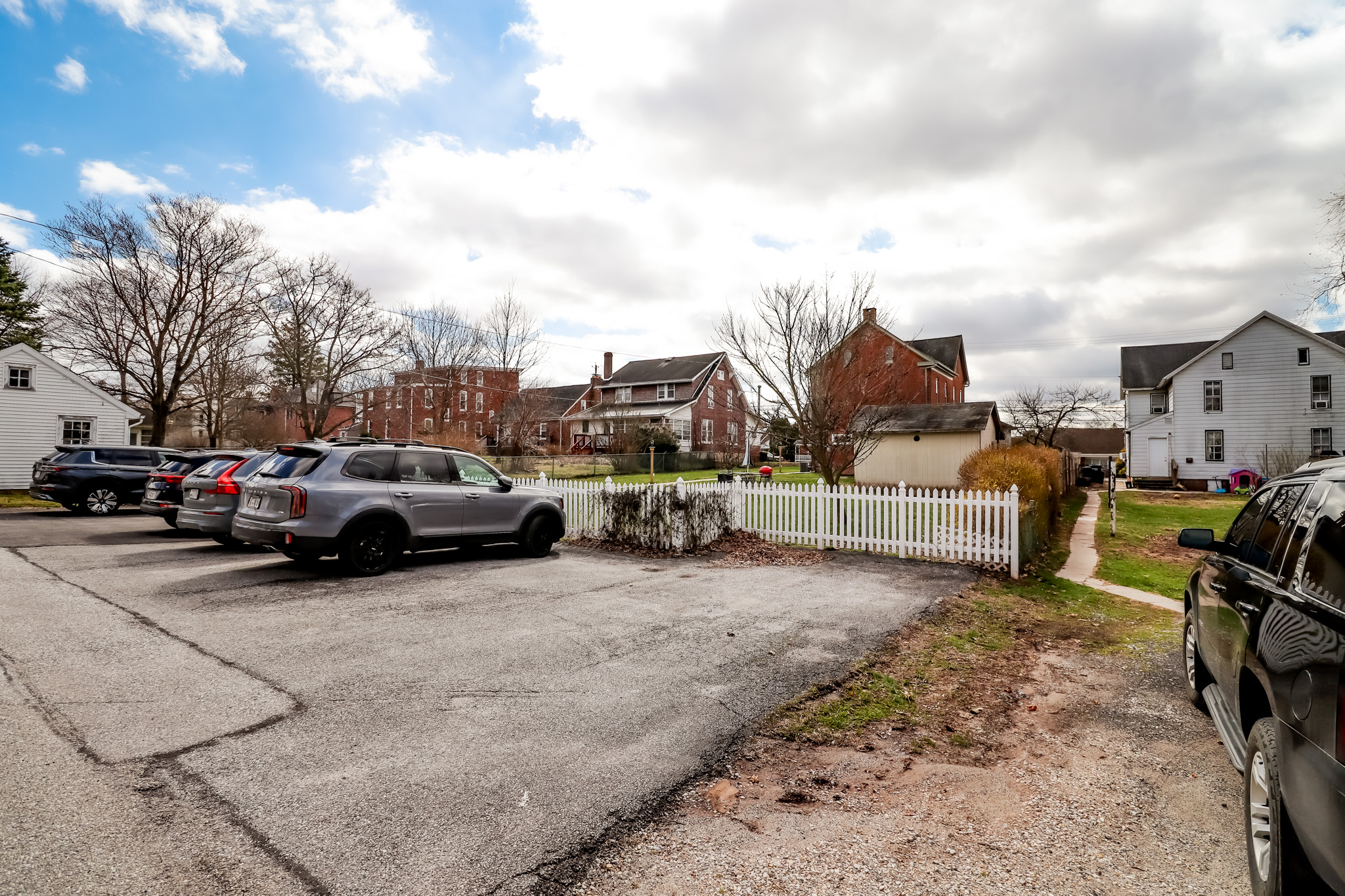 Parking Area in rear for 6-8 cars on both sides of alley way