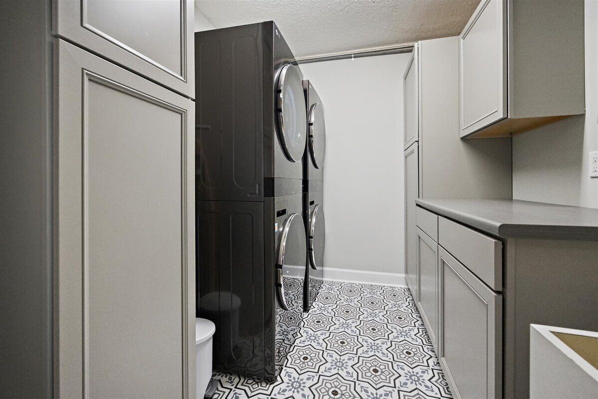 Laundry with 2 washers and 2 dryers