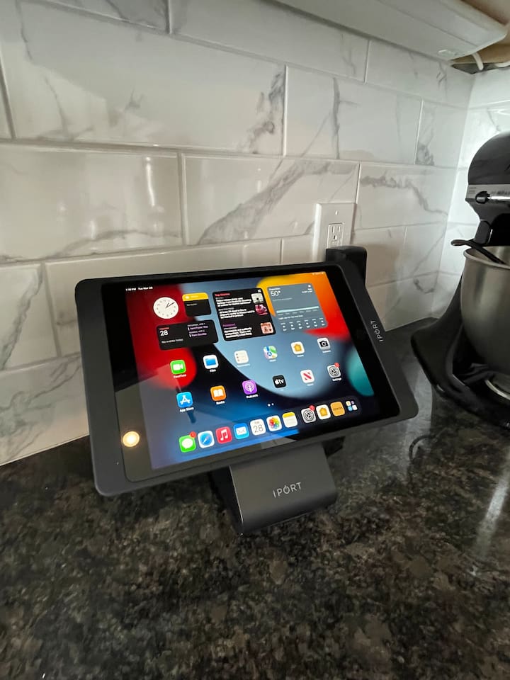 iPad tablet for guest use with control for the entire condo sound system, and common apps to use while staying in the Executive “Sweet 503.”