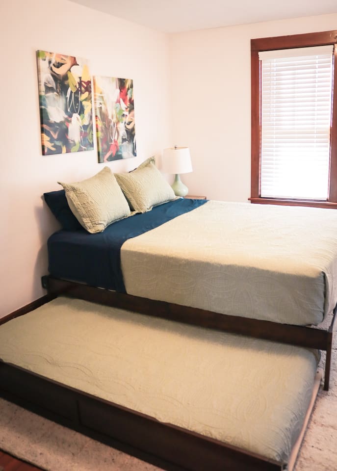 Twin trundle bed.  Additional pillows in dresser